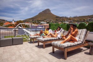 Guests enjoying rooftop bar in Cape Town